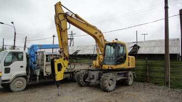 Аренда колесного экскаватора с гидромолотом Komatsu 170